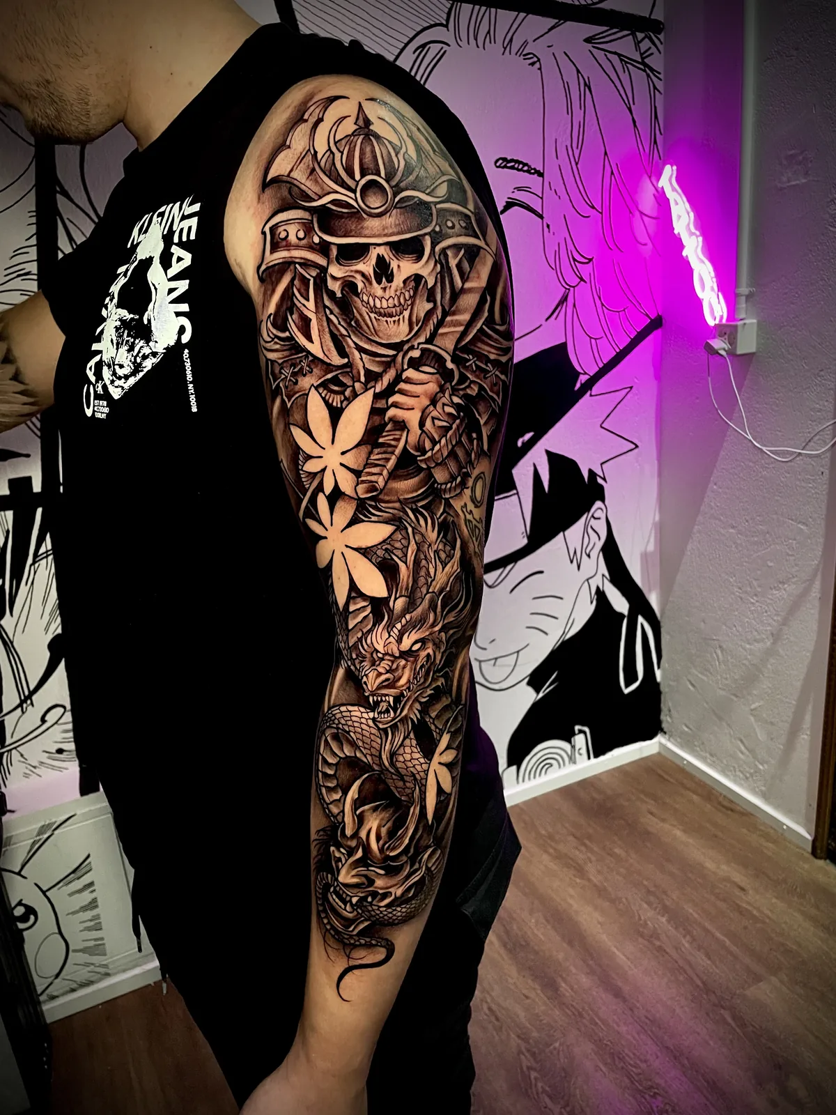 Trabalho de tatuagem da District Tattoo