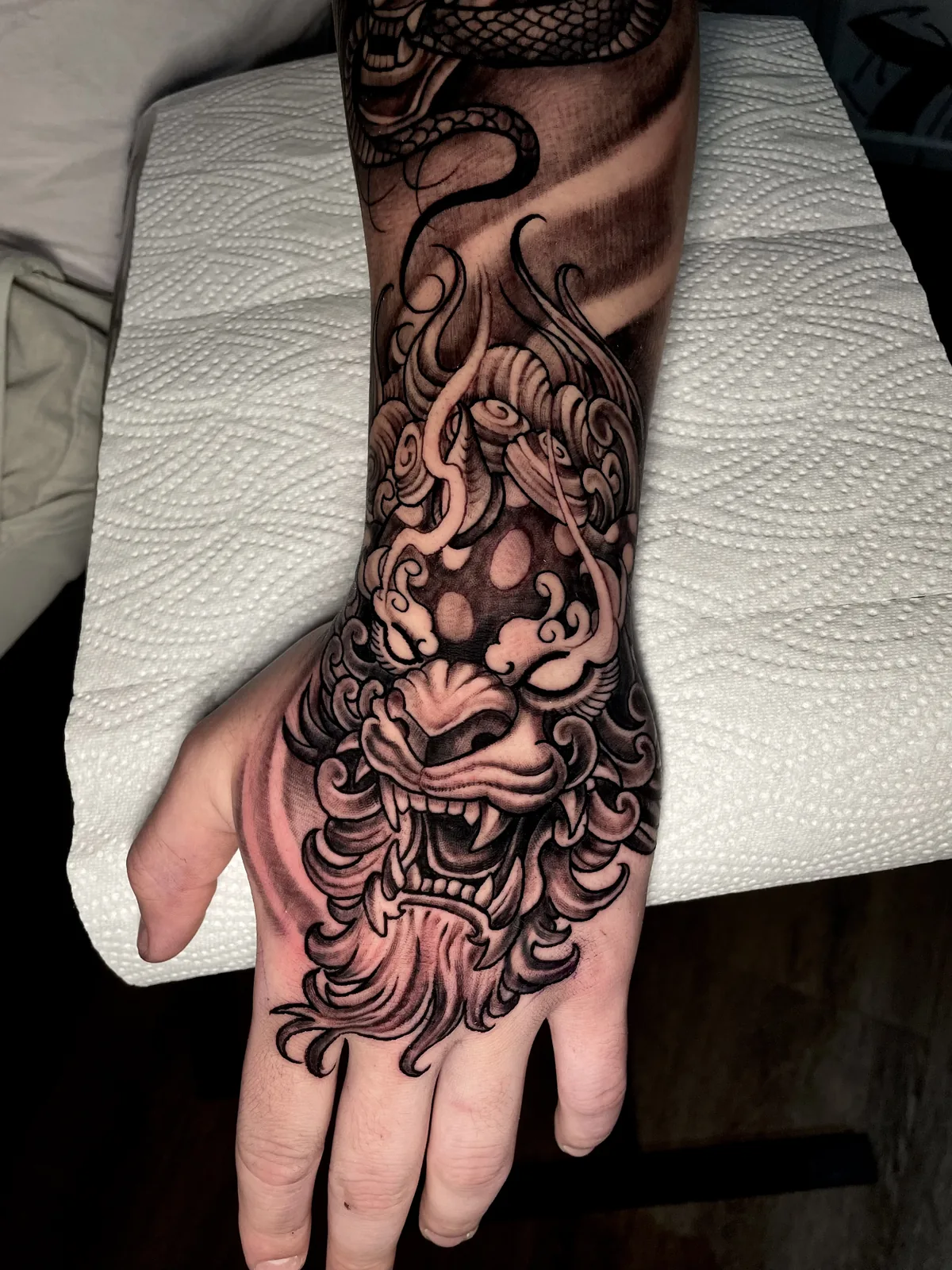 Trabalho de tatuagem da District Tattoo
