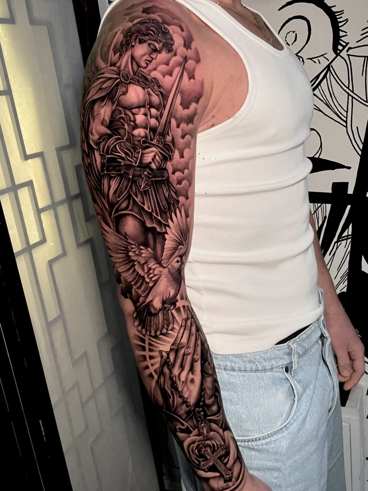 Trabalho de tatuagem da District Tattoo