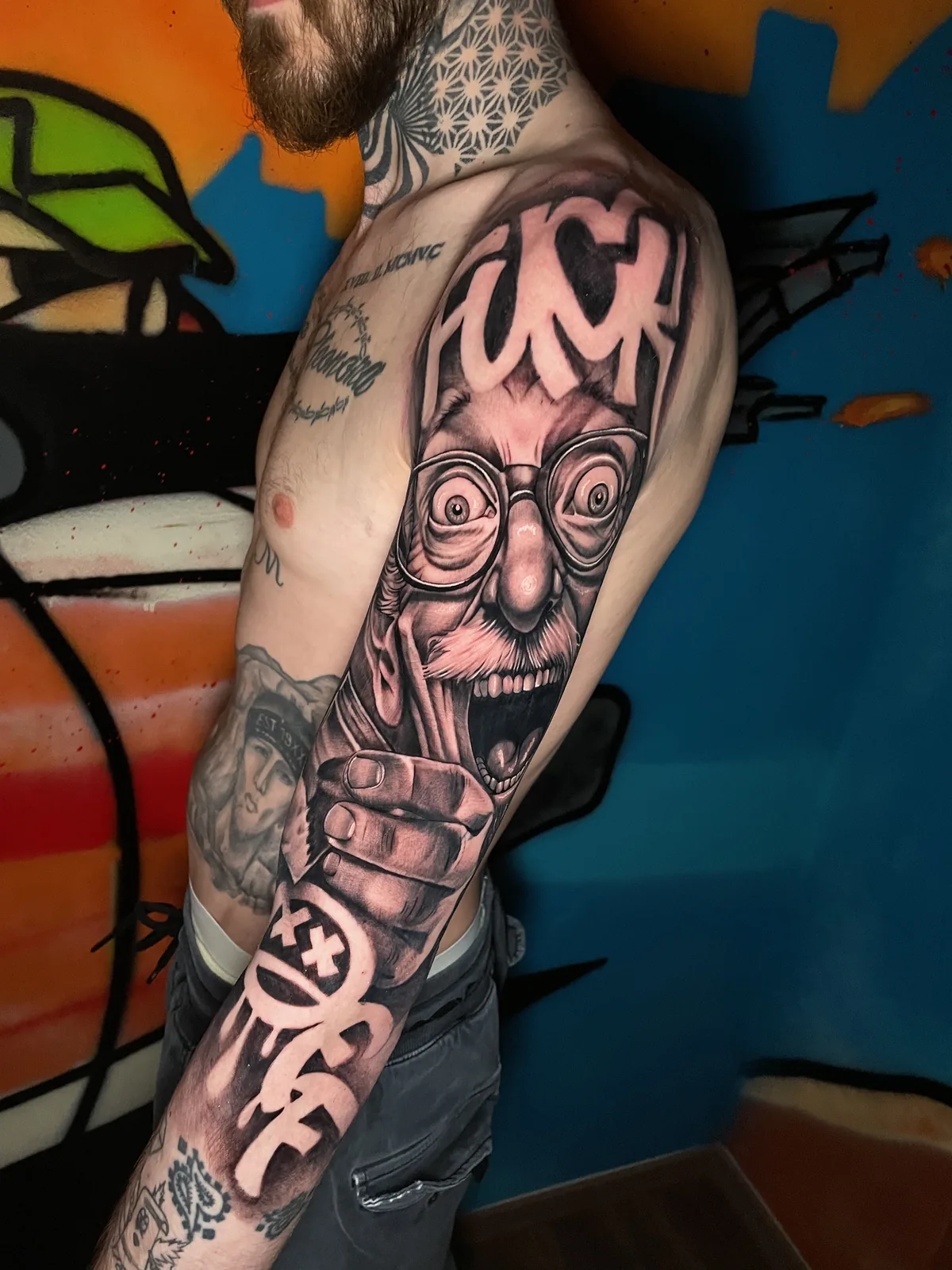 Trabalho de tatuagem da District Tattoo