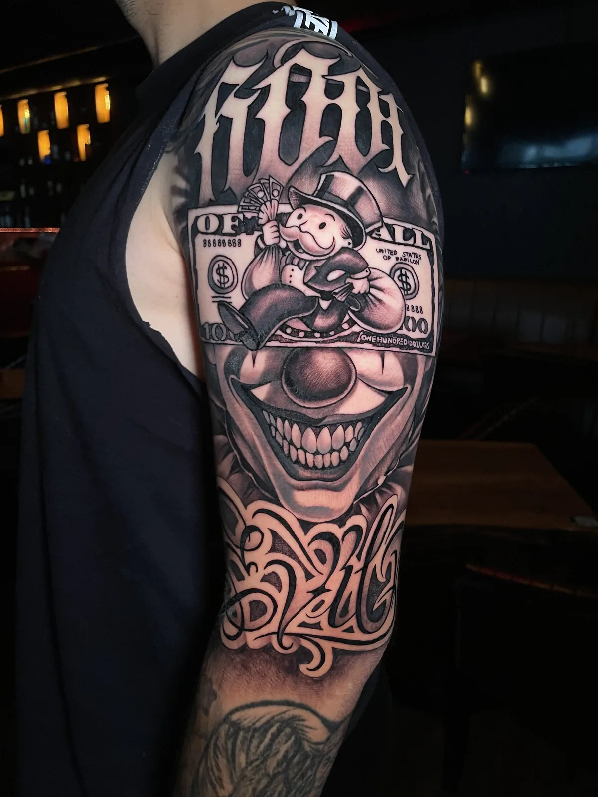 Trabalho de tatuagem da District Tattoo