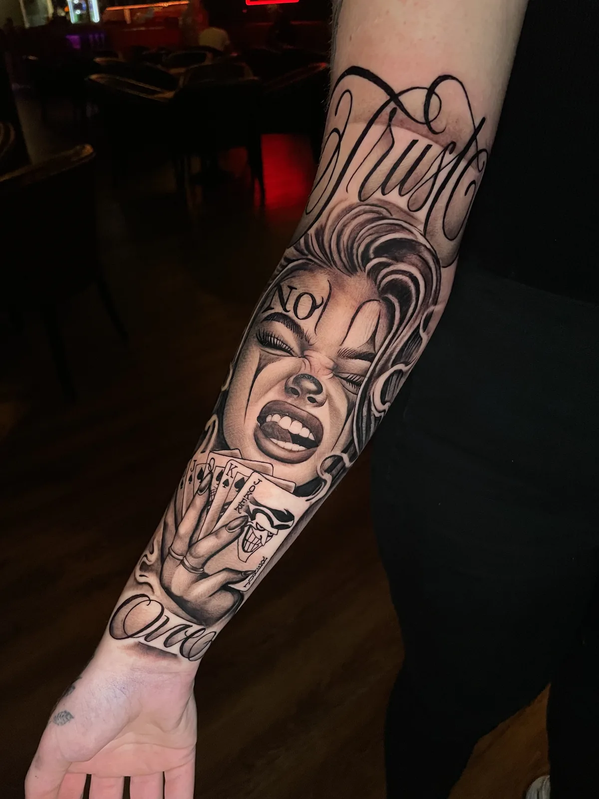 Trabalho de tatuagem da District Tattoo